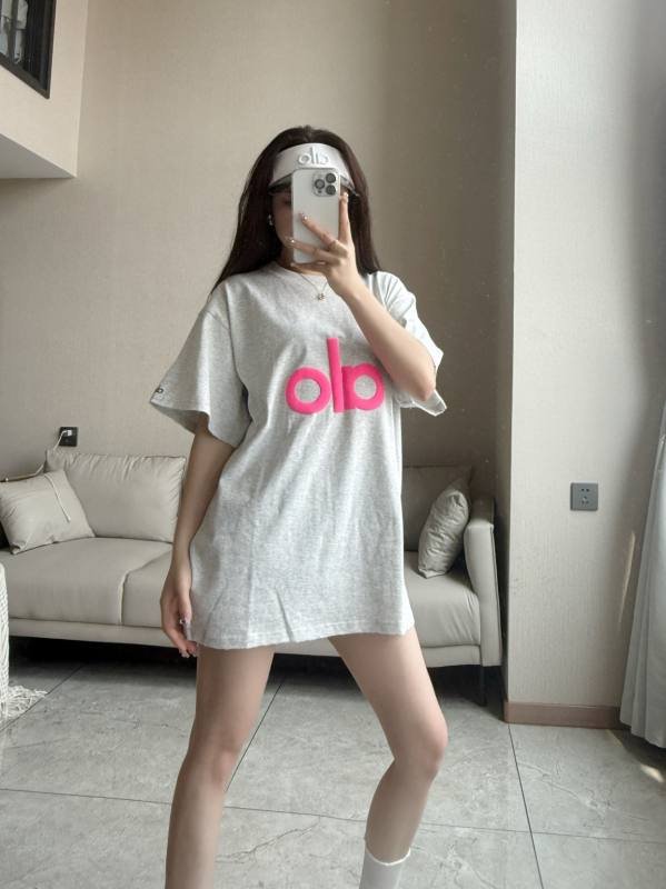 Camiseta Alo daily gris jaspeado claro con logo rosa